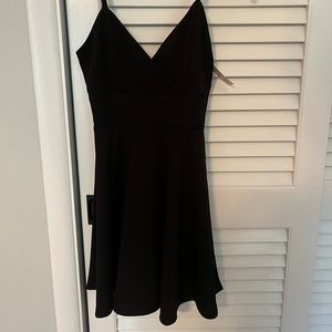 Francesca’s black skater dress